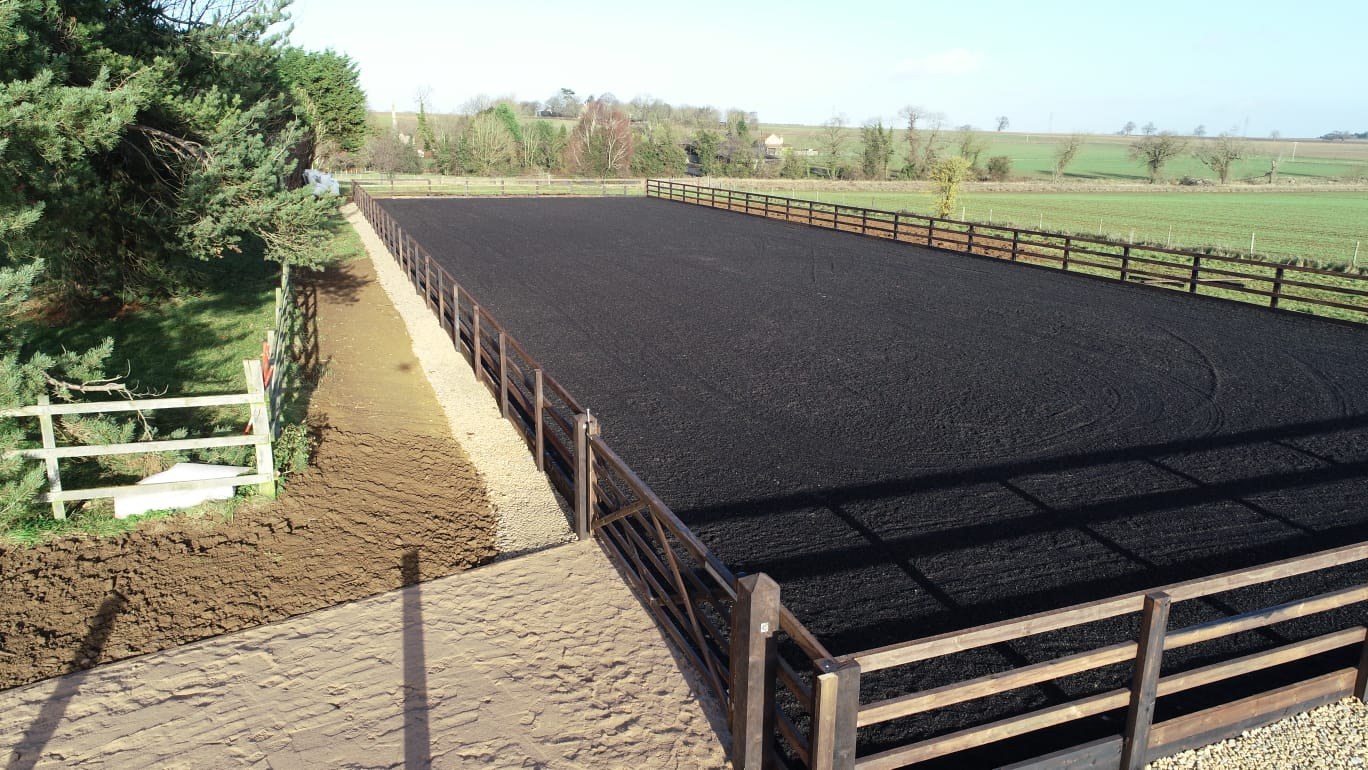 Aerial view of a finished black rubber arena, angle 2