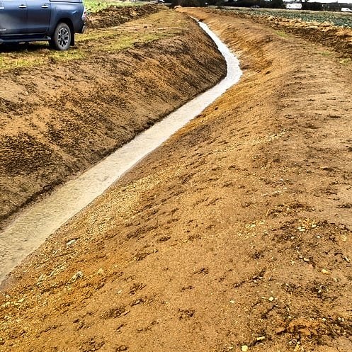 Concrete lined drainage channel